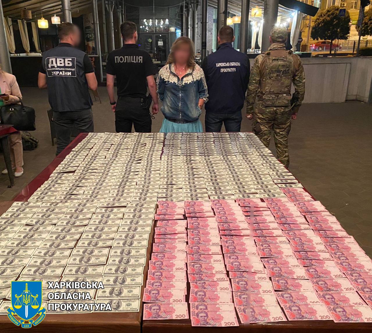У Харкові затримано жінку, яка за 29 000 доларів США допомагала чоловікам оформити фейкову інвалідність